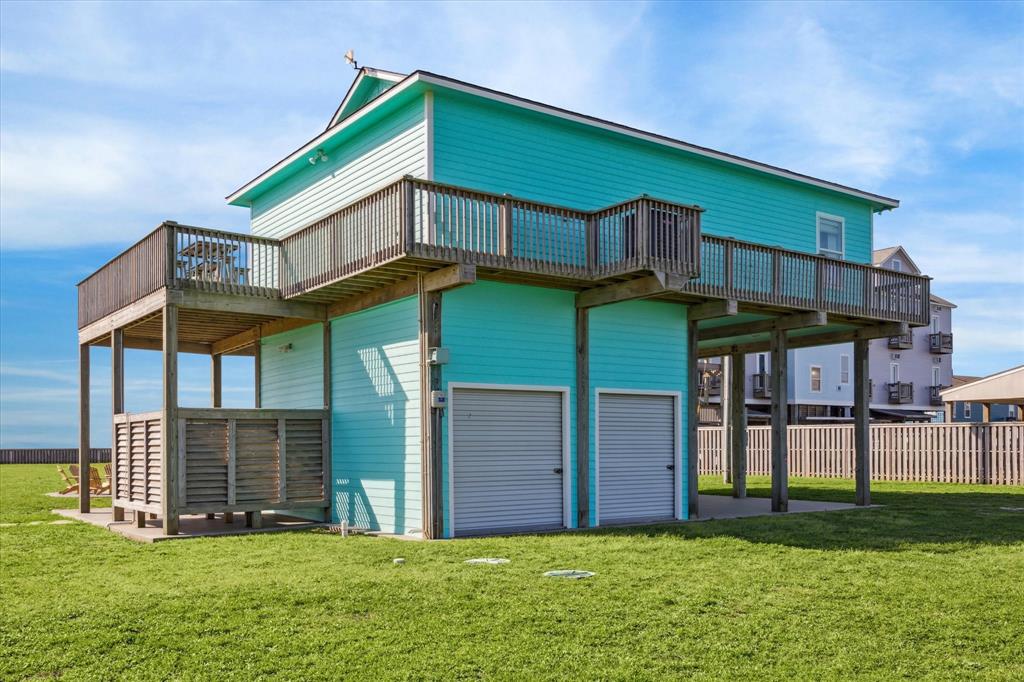 Big, Beautiful Beachhouse  with new roof, new lighting, newer windows, wrap-around porch, and 2-car garage