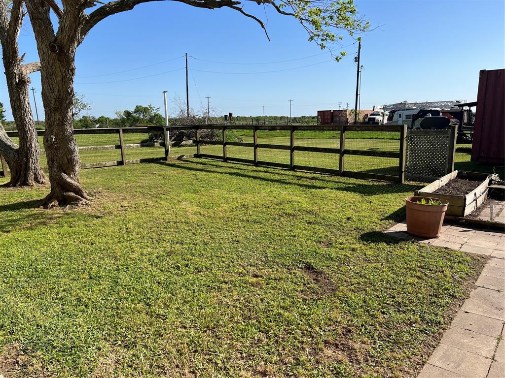 The partially fenced back yard - The possibilities are endless!