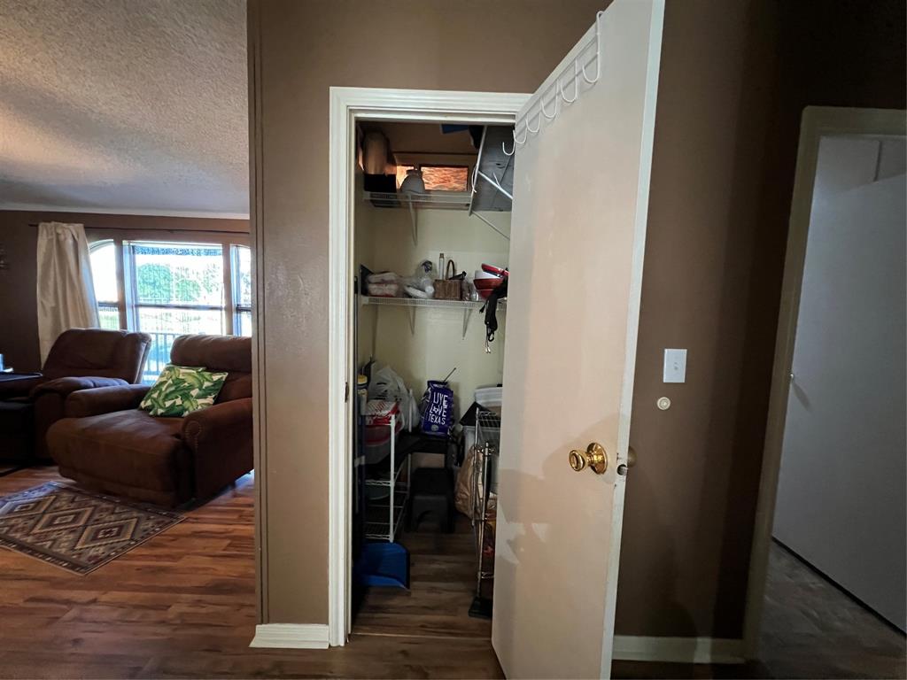 Between living room and kitchen/dining.