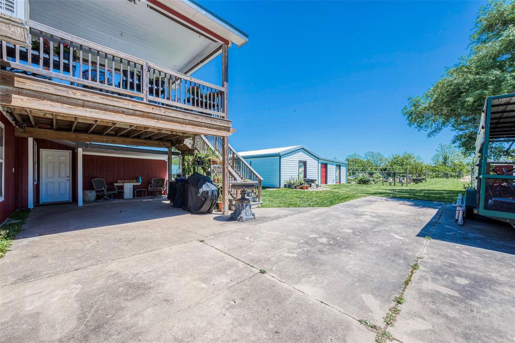 carport and plenty of space to park trucks and trailers