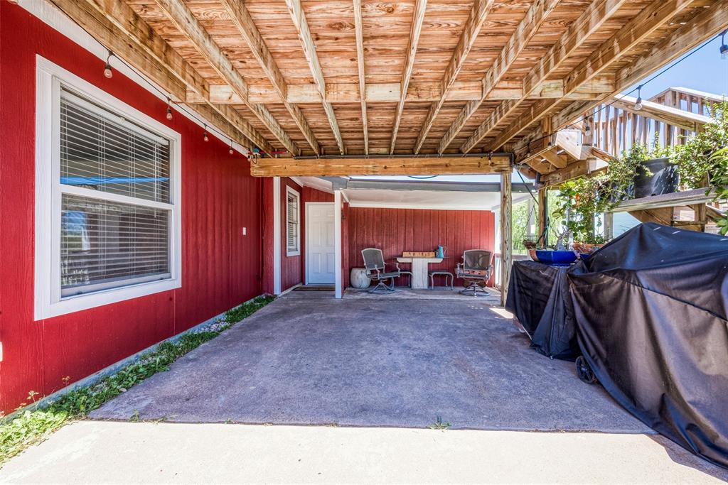 Closer look at the carport- plenty of space for more than just a car/truck