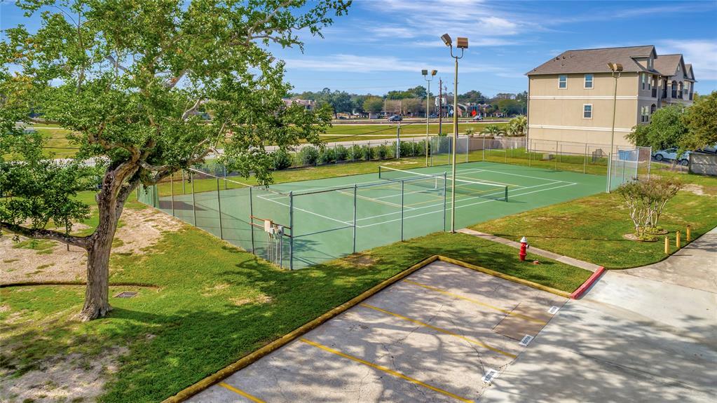 One of the great community amenities, a Newly Surfaced Tennis / Pickle Ball Court (2023).