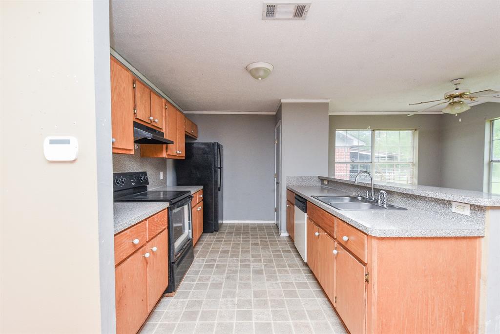 Kitchen with black applicances