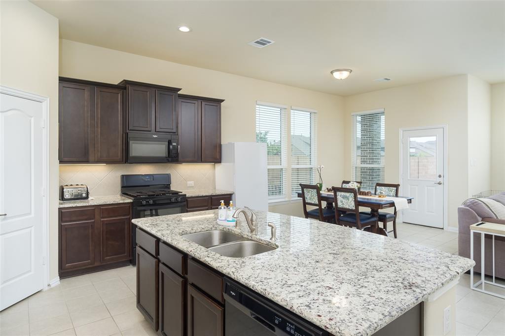 Great sized kitchen space, island offers added storage