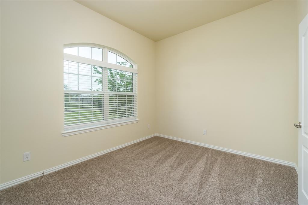 Secondary bedroom at the front of the home