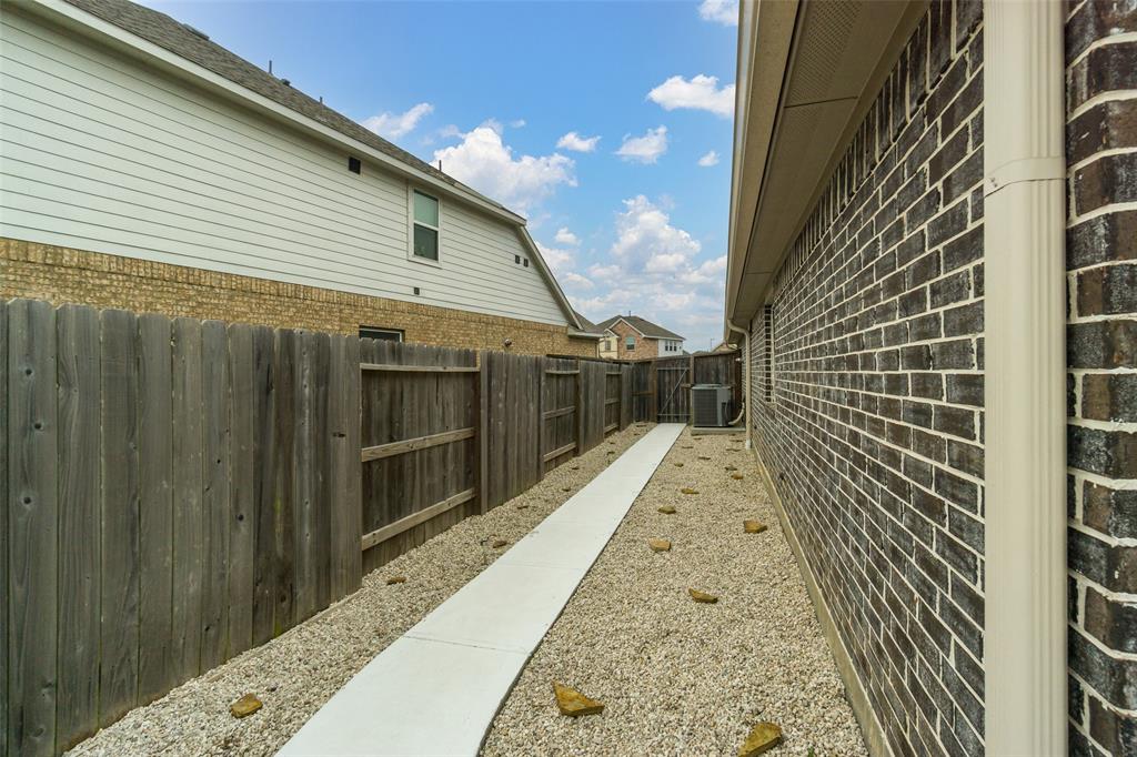 Sidewalk leading to the front of the home