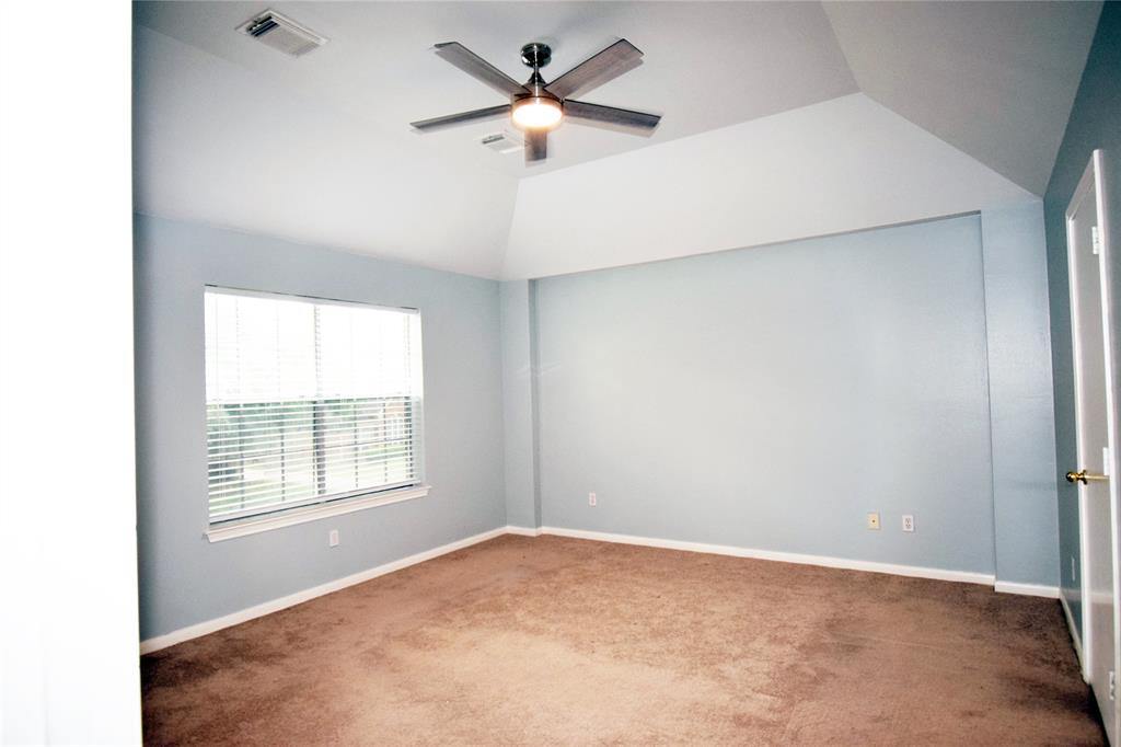 Oversized Primary Bedroom with Ceiling Fans