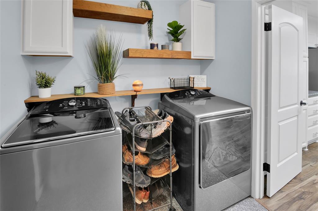 Plenty of room for your washer and dryer in the spacious laundry room off the kitchen