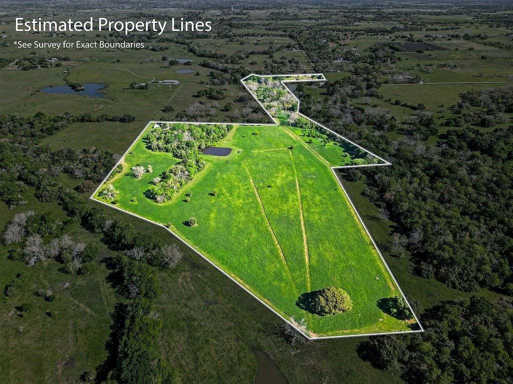 Located between Houston & San Antonio, this 53 acres is located 5min south of Weimar on a paved, dead-end county maintained road. This exceptional property features a mix of pastureland for grazing & partial woods for wildlife. The front offers an all-weather road/bridge across West Sandy Creek to access the back, which is highlighted by a secluded homesite surrounded by woods & no neighbor in sight. The back features scattered trees, electricity to 30'x50' storage barn, solar water well & pond for fishing/waterfowl hunting. Mature Live Oak & Pecan trees can be found along the entrance road & creek. The property consists of mainly loamy fine sand soil with +/-320' to +/-340' elevation. No pipelines or easements. Ag-exempt. Minerals negotiable. Good fencing & cross-fence. Additional acreage available. Located less than 1 hour from Buc-ee's in Katy. This premier property offers an ideal homesite for permanent resident and/or use as a recreational retreat for weekender/outdoorsman!