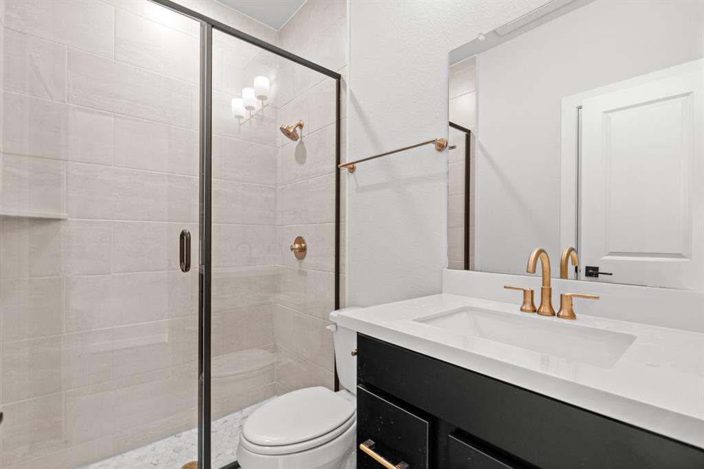 Main Bathroom with dual sinks, separate shower, tub and walk-in closet.