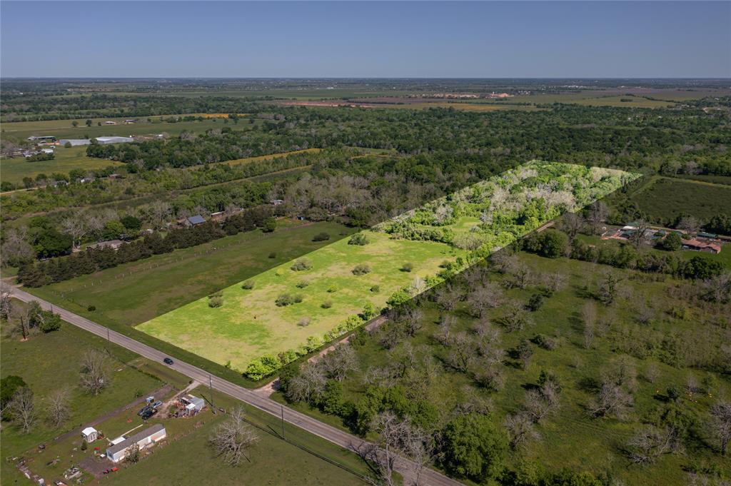 Welcome to the Country! Escape the hustle and bustle of city life and build your dream home on this UNRESTRICTED 12.12 acre tract in Hungerford, TX (Wharton County) and zoned to Boling ISD! With road frontage on 2 county maintained roads (approximately 280 feet on the paved FM 1161 and approximately 1,100 feet on the gravel surface Mangum Road), the property has development potential and could be subdivided into small acreage homesite tracts to be sold at a premium.  The property is fenced on 3 sides with the front of the property being primarily cleared pasture and the back half being heavily wooded and home to deer, wild hogs, racoons, squirrels and other wildlife. A short 25-30 minute commute to Sugar Land makes it easy to work in the big city and still live the country life!  This property is a blank canvas waiting for you to create your masterpiece! Don't miss out on all this great tract has to offer! Schedule your showing today! Adjacent 29.5 acres is for sale - MLS # 86036393.