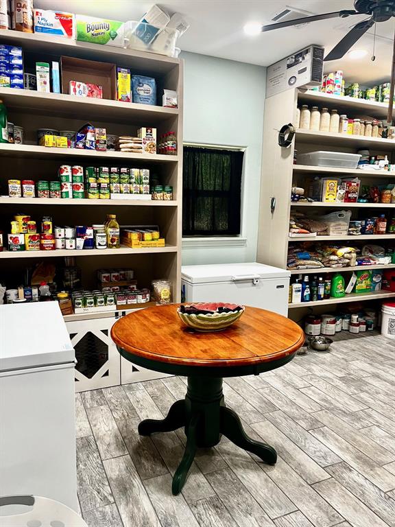 This flex room has so many possibilities. It is currently used as a laundry room and extra pantry space.