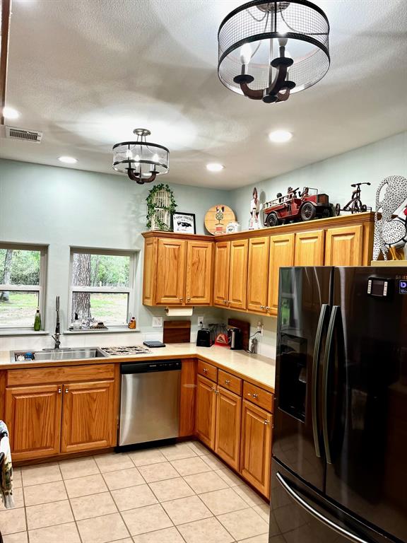 The kitchen is nice and bright with plenty of cabinet and counter space.