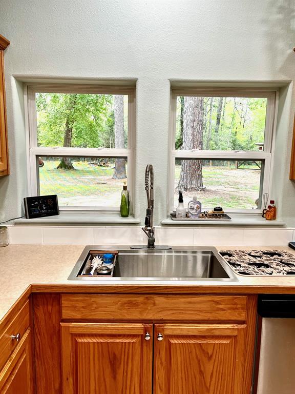 The kitchen is nice and bright with plenty of cabinet and counter space.