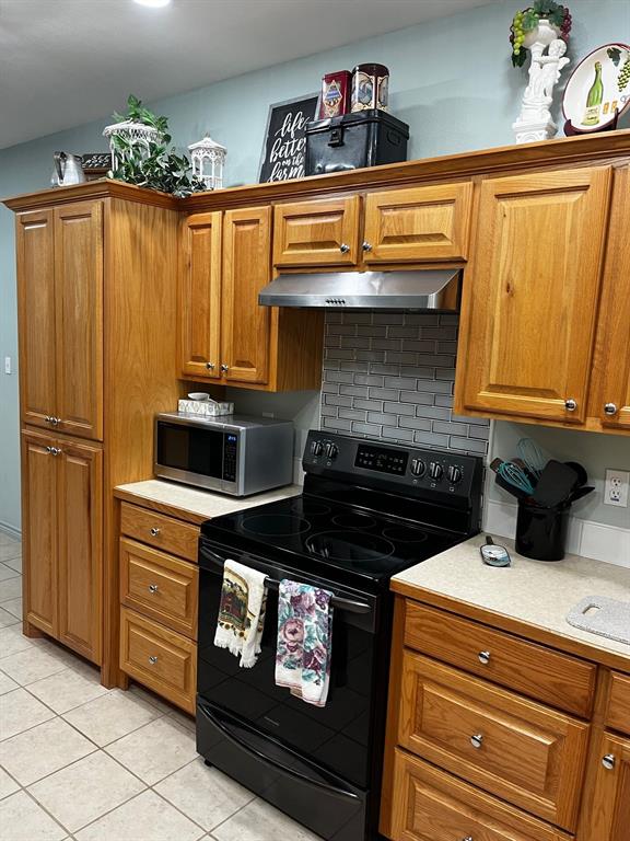 The kitchen is nice and bright with plenty of cabinet and counter space.