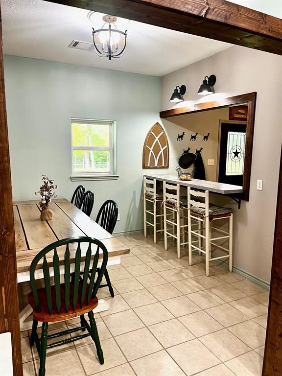 The kitchen leads into the dining room.