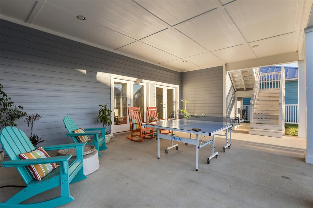 Downstairs covered porch with plenty of room.