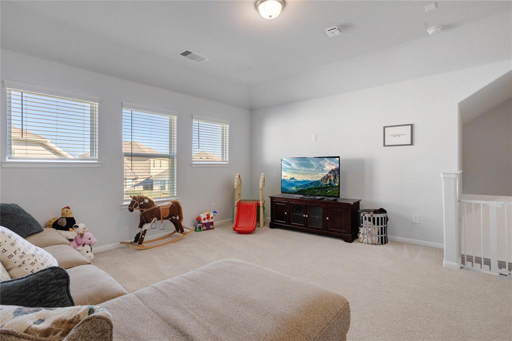 Large game room has dedicated bath, allowing it to be used as a bonus bedroom if necessary