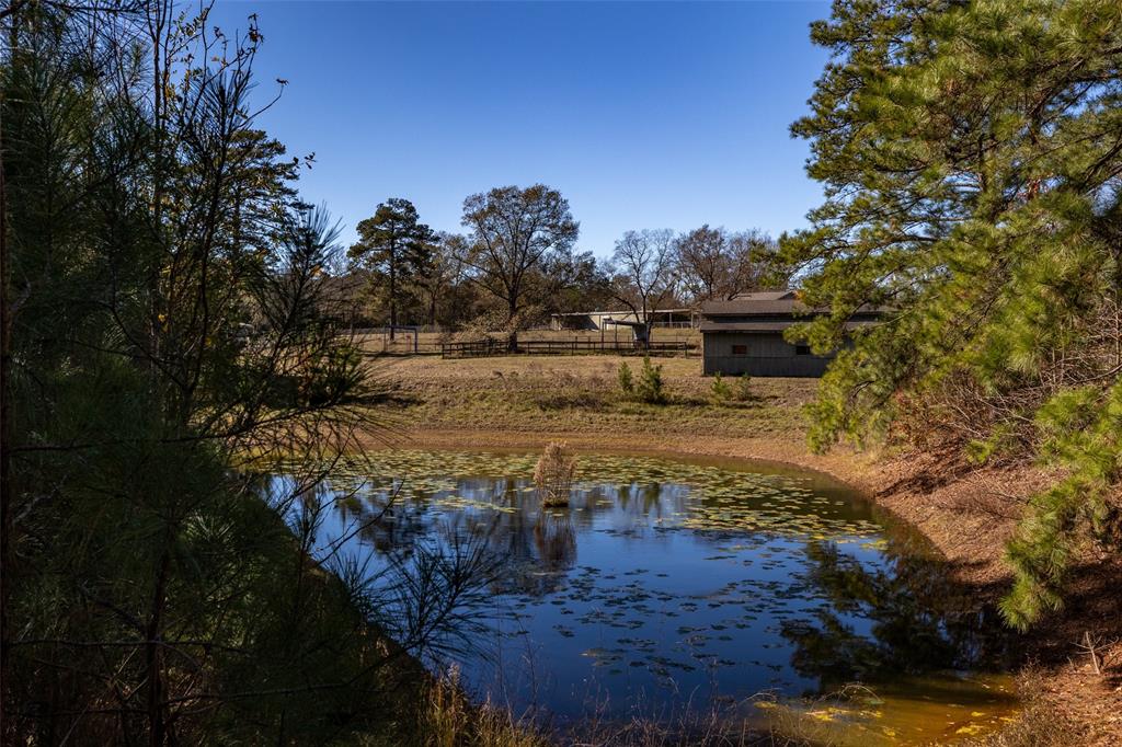 Experience the ranch life on this pristine 10.6-acre property with water and electricity already in place. Featuring a 7 stall barn, storage building, and multiple loafing sheds, this property is perfect for starting your ranching adventure. All pastures are fenced and cross fenced, providing ample space for your livestock. Embrace the opportunity to customize this property to fit your vision. With a spring-fed pond, and sloping terrain, this property offers endless possibilities for a peaceful countryside lifestyle. Don't miss out on this chance to create your dream ranch!