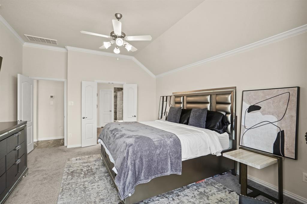 An alternate view of the Primary Suite looking toward your private en-suite bathroom. There\'s plenty of space for a King bed and other large furnishings with room to spare.