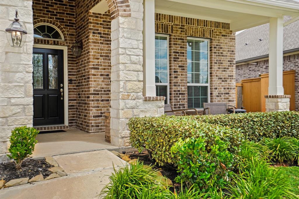 A charming covered front porch and decorative beveled glass front door will welcome you inside the nearly 2,000sf floor plan.