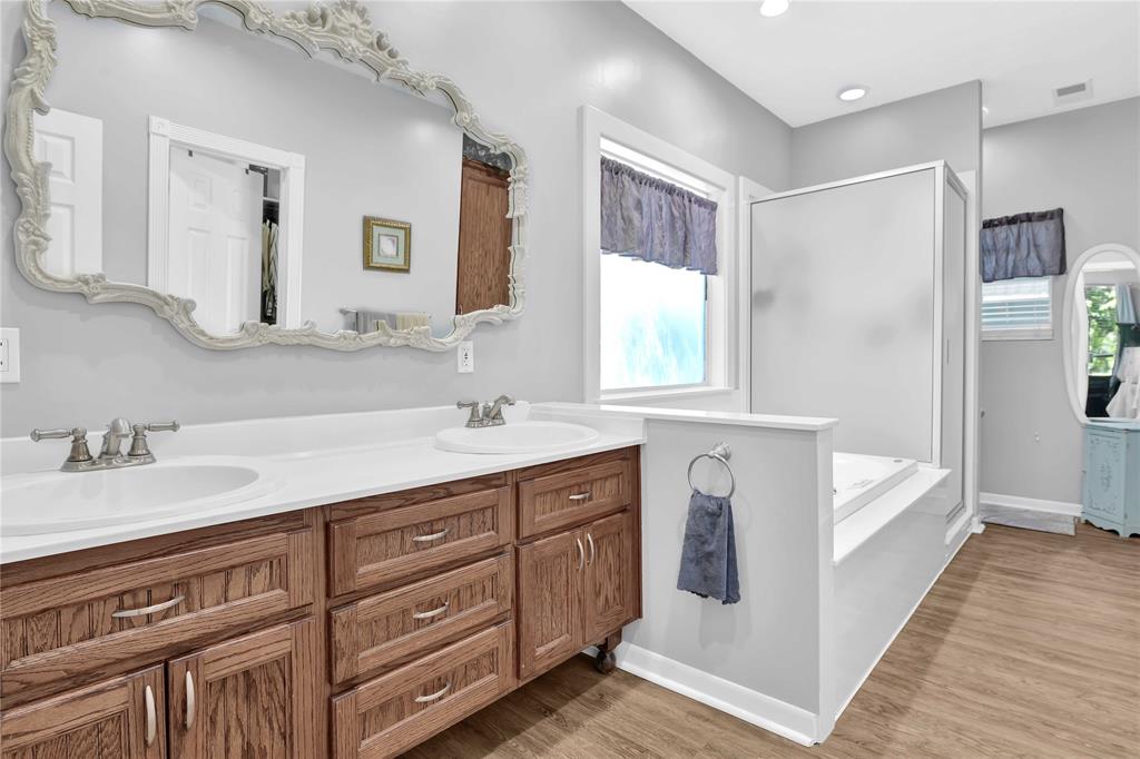 Wonderful jetted tub with walk-in shower.