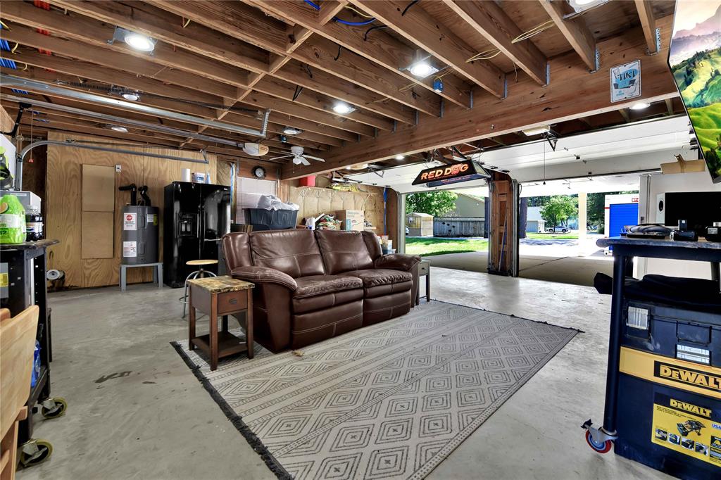 Oversized garage for a mancave or parking cars with lots of storage.