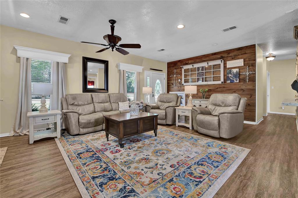 Living room has a great flow to dining area and kitchen.