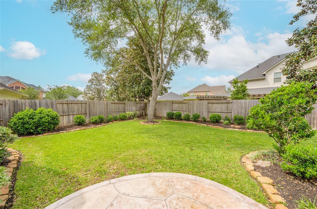 Easy-to-maintain landscaping creates a relaxing outdoor living space.