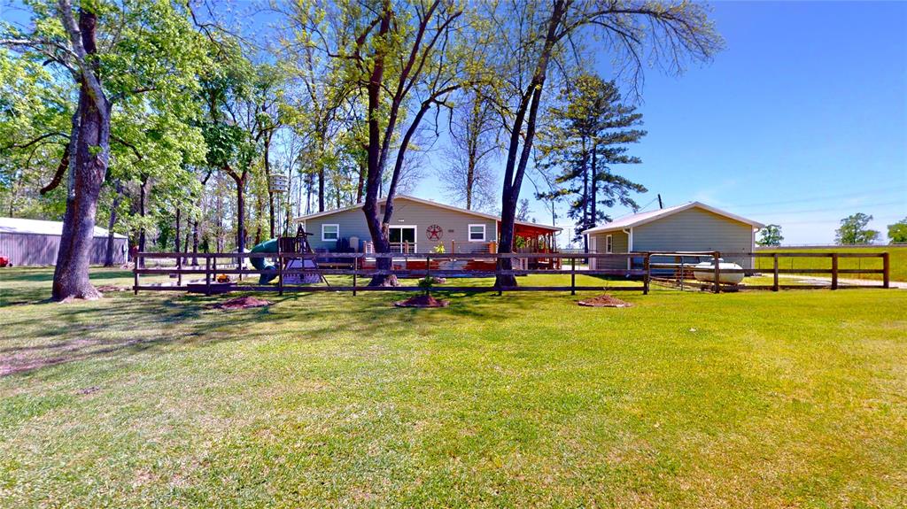 Full 2 acres is fenced as well as the immediate area surrounding the home