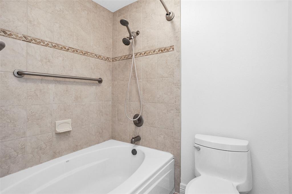 En Suite Primary Bathroom offers a separate tub/toilet area.