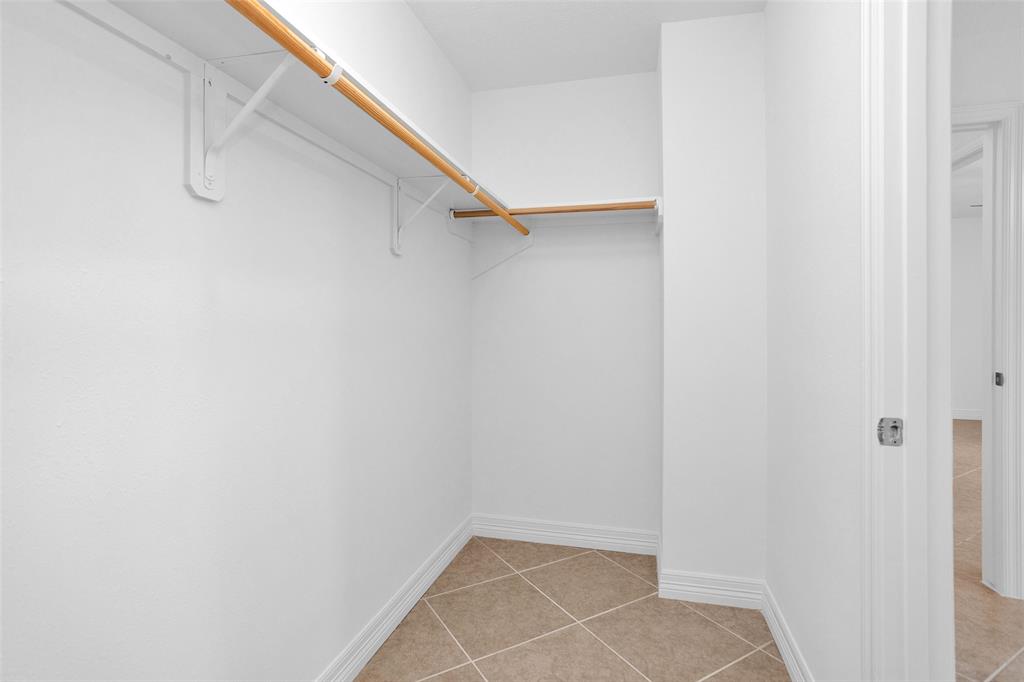 Sizeable walk-in closet & tile floors.