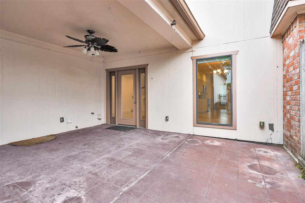 The generous Covered Patio w/ a ceiling fan is a perfect place to relax, lounge & entertain.