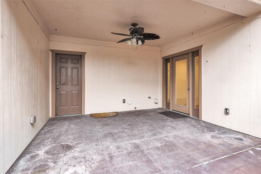 Covered Patio offers easy access to the Utility Room/Garage & First Floor Living Areas.