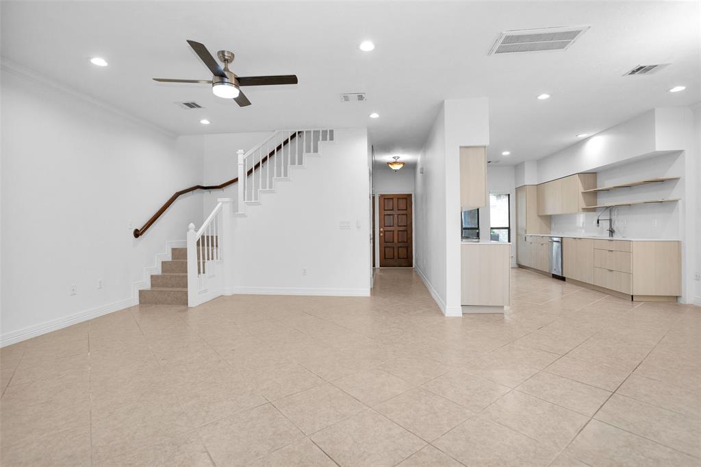 Family Room opens to the hallway, Kitchen & stairs.