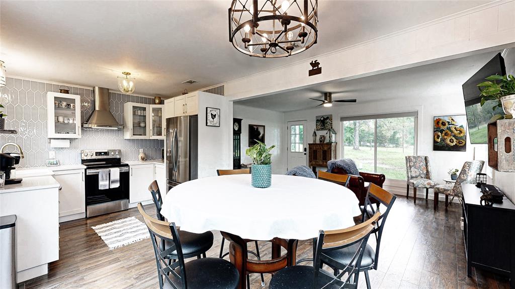 A view from the Breakfast Area into the Kitchen and Living Room.