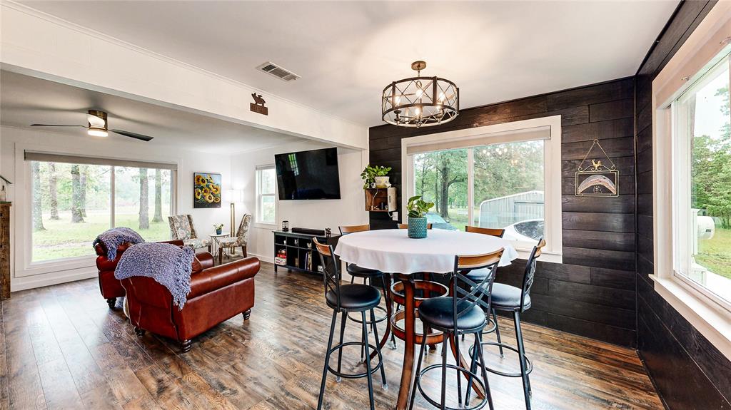 Shiplap accent wall and rustic shelve are just some of the charm this home offers.