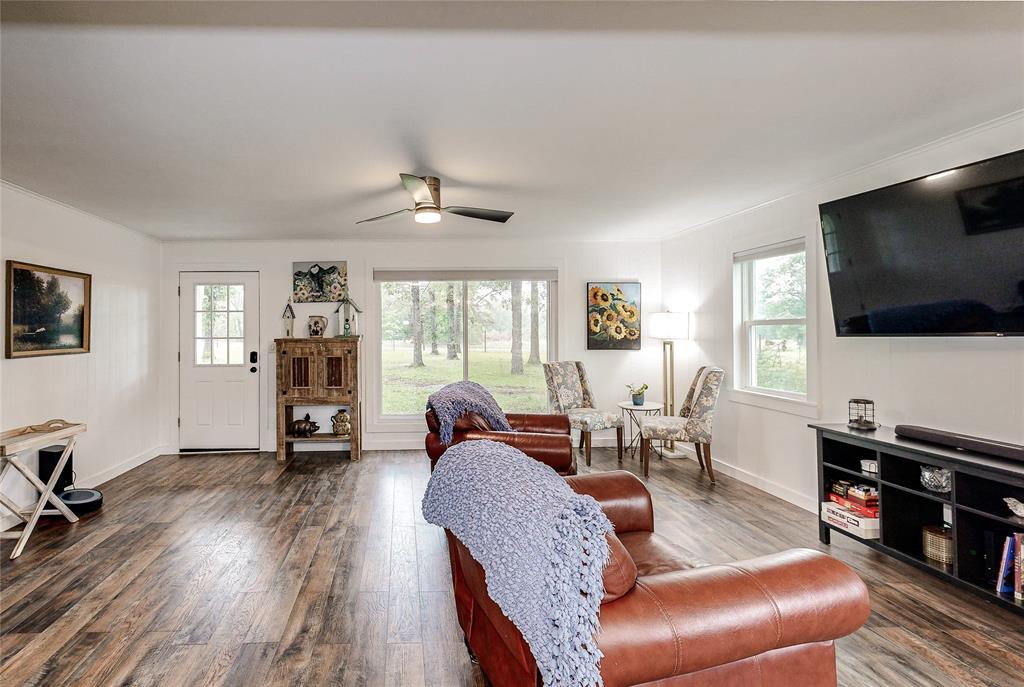 Gleaming wood-look laminate flooring great you in every room. Huge Picture windows provide an abundance of natural lighting while you enjoy viewing your serene surroundings.