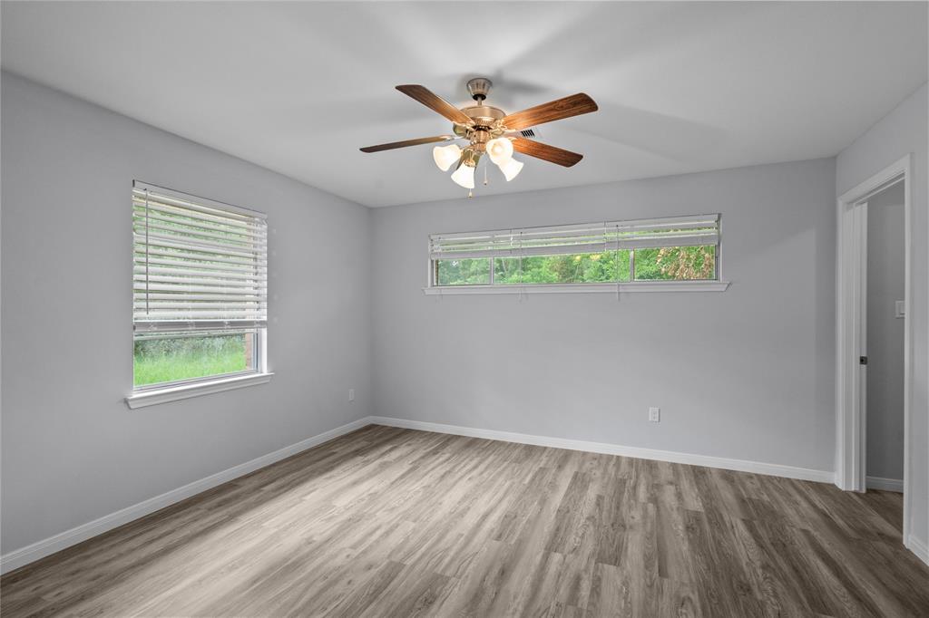 This bedroom offers plenty of natural light throughout.