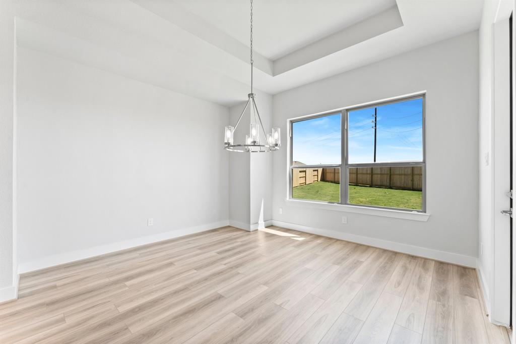 Generous 13x13 Dining Area with views of the backyard.