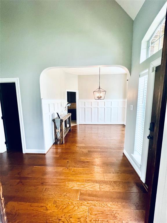 Formal dining with newly painted neutral walls presenting a bright and open space for entertaining. Also great space to extend the kitchen.