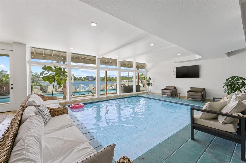 Impress your guests with this indoor heated pool offering scenic views.