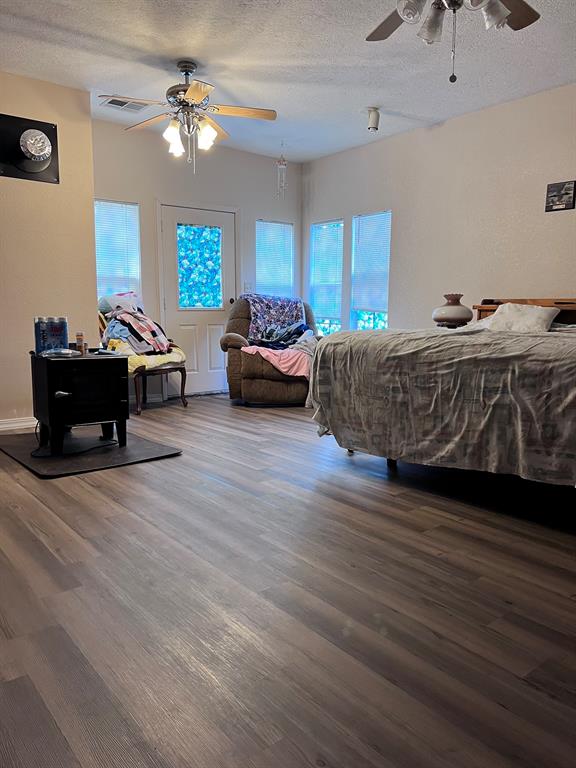 BIG PRIMARY BEDROOM WITH WOOD BURNING STOVE