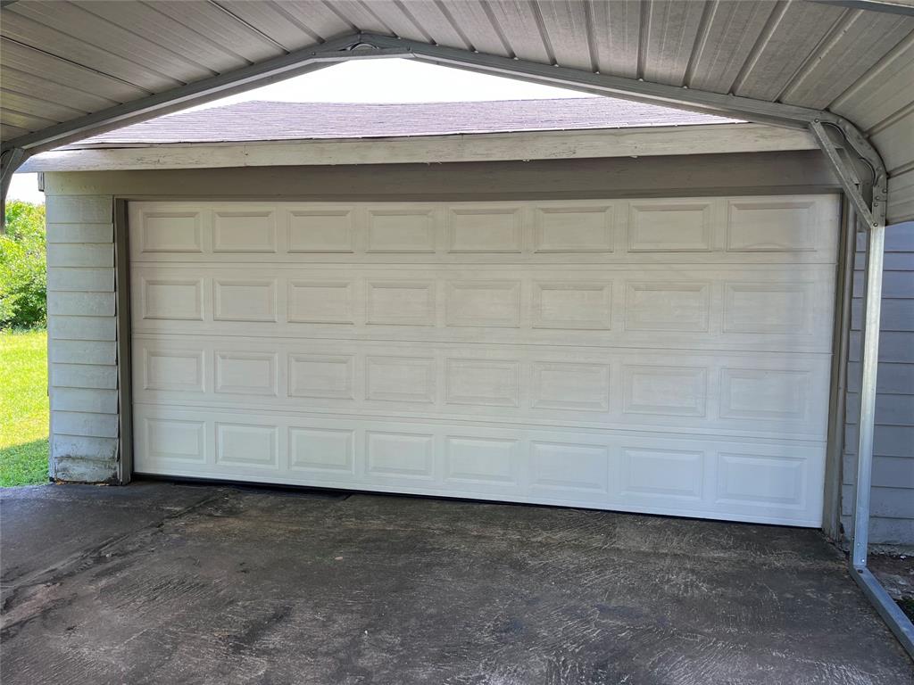 Two car garage with attached two car carport