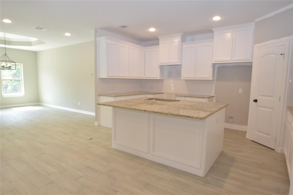 ANOTHER VIEW OF THE KITCHEN AREA