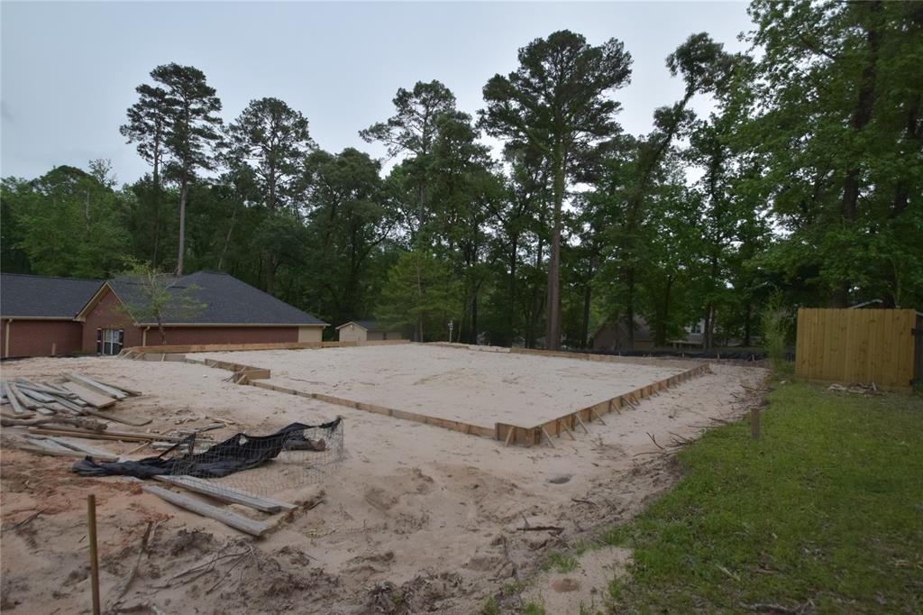 FRONT FACING LARGE 3 CAR GARAGE TO BE BUILT.