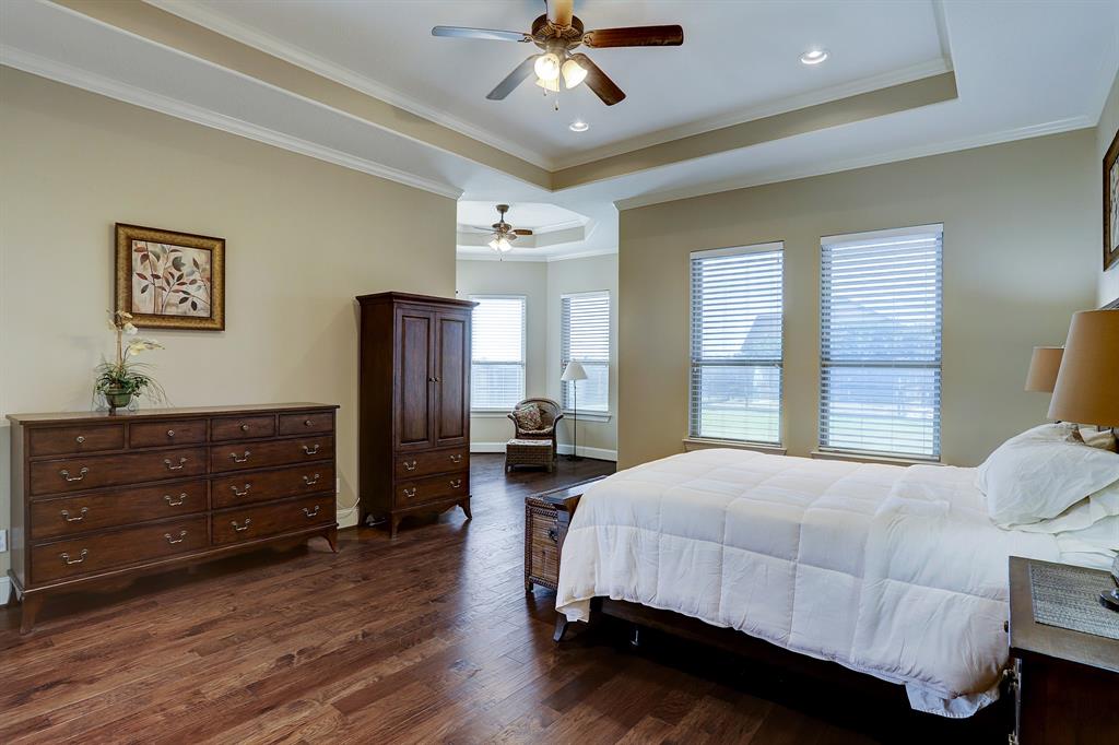 Spacious Primary Bedroom with lots of light from the windows