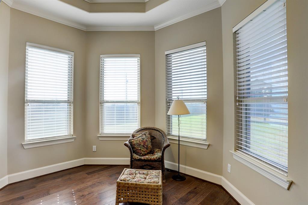 Serene sitting room nestled within the primary bedroom.