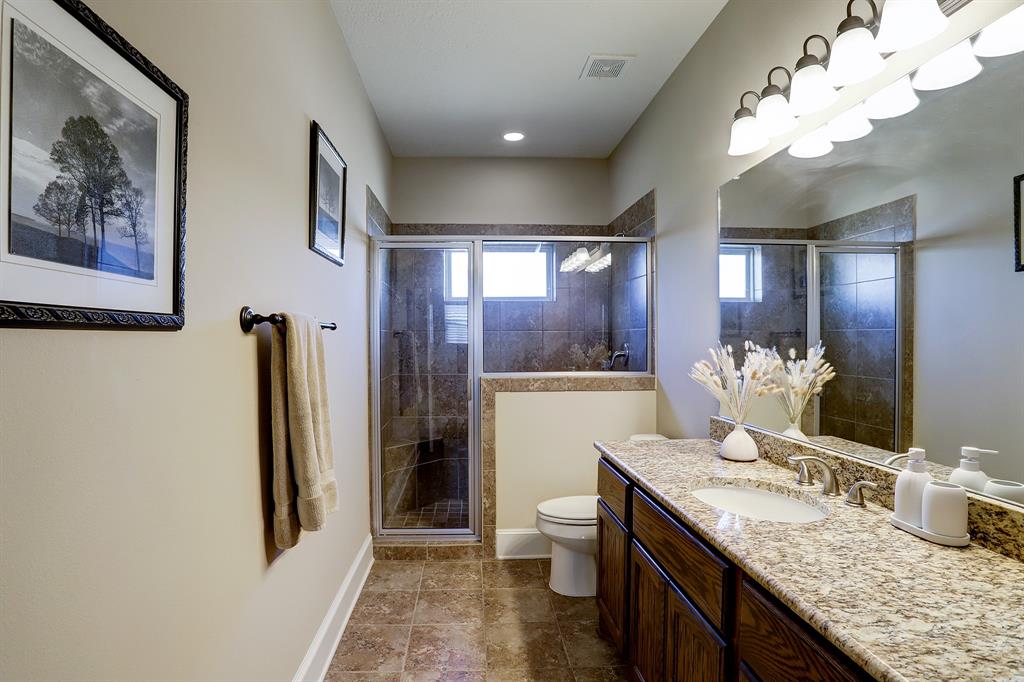 Large Bathroom #2 includes plenty of storage.