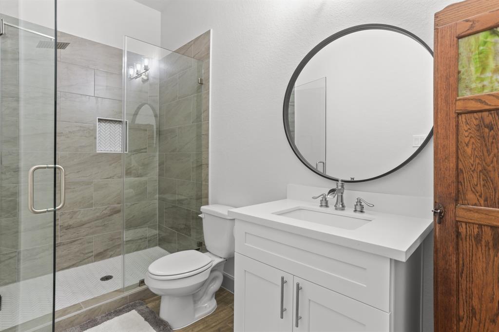 Beautiful bathroom in the 4th bedroom. Also has a private door leading out to the covered outside patio.